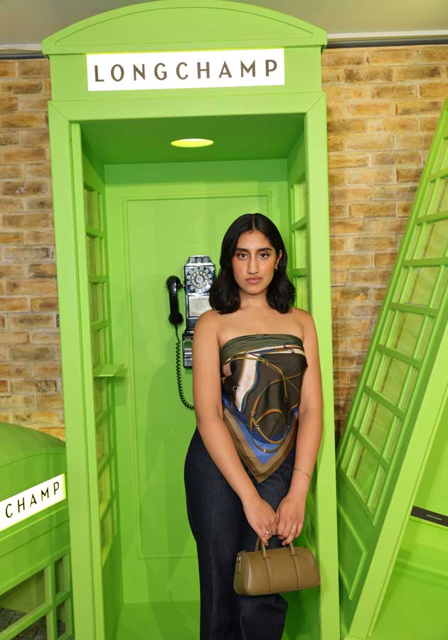 Guests posing at the Longchamp London Calling event on Regent Street