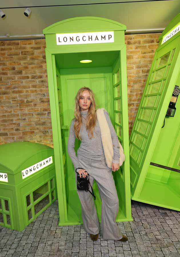 Guests posing at the Longchamp London Calling event on Regent Street